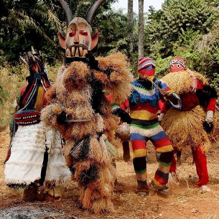 Igbo masquerade spirits in traditional regalia