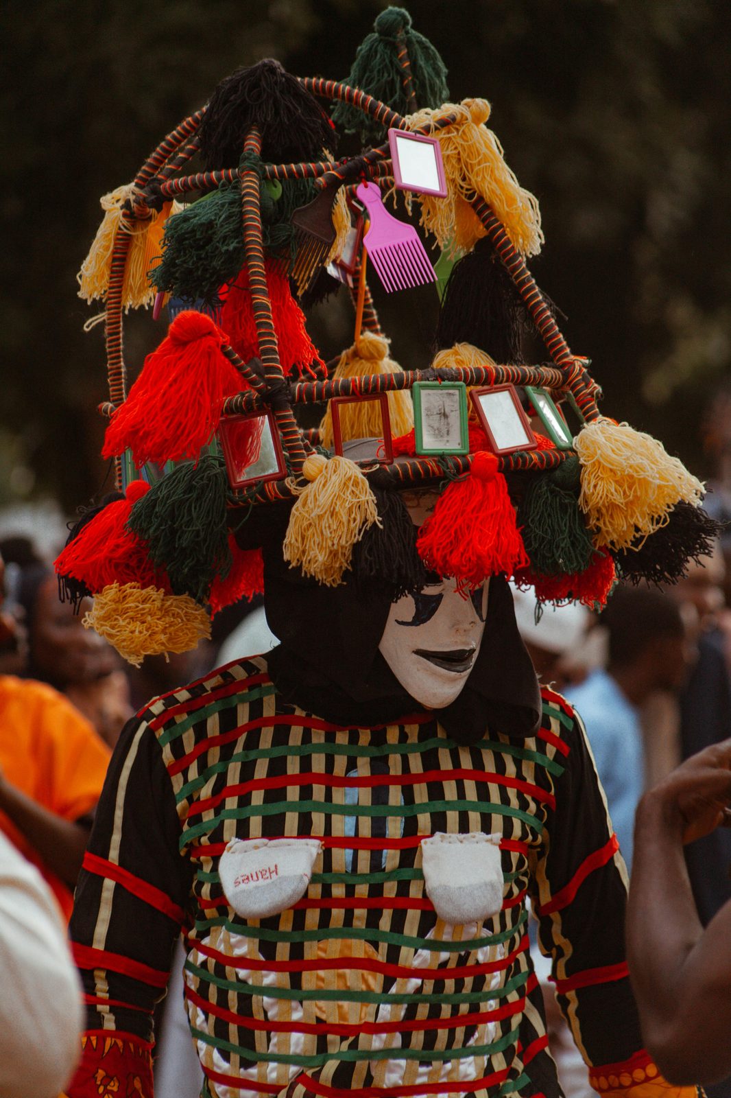 Igbo masquerade with mirrored headdress