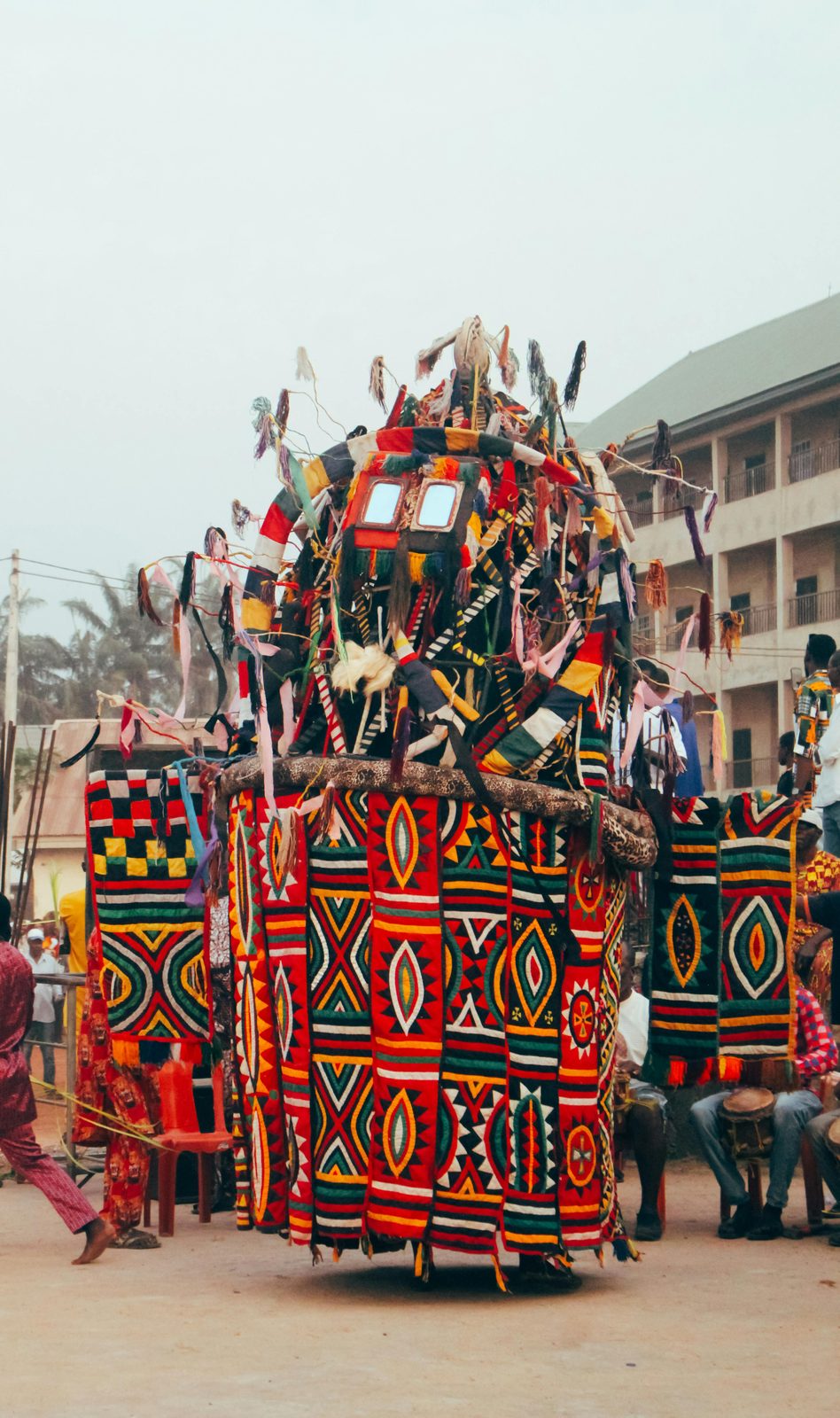 Igbo masquerade with painted mask